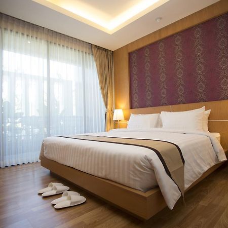 Baitong Hotel Tachileik Extérieur photo
