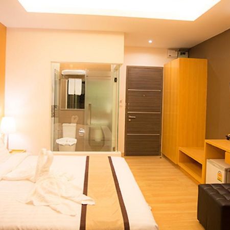 Baitong Hotel Tachileik Extérieur photo
